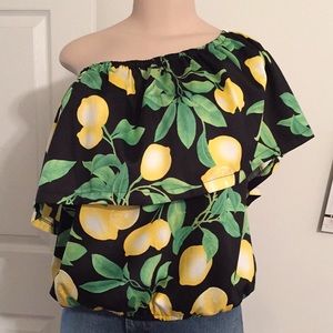Black lemon print versatile flounce shirt.